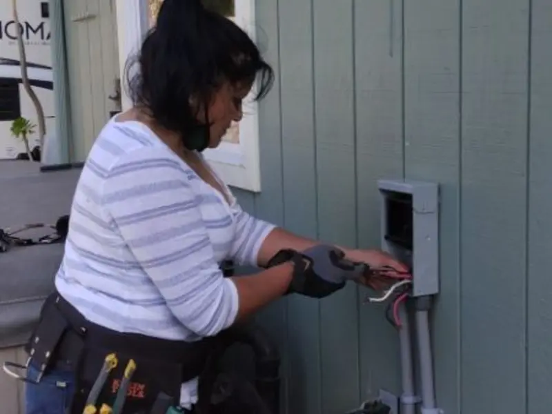 Licensed electrician wiring an exterior subpanel in Cedartown